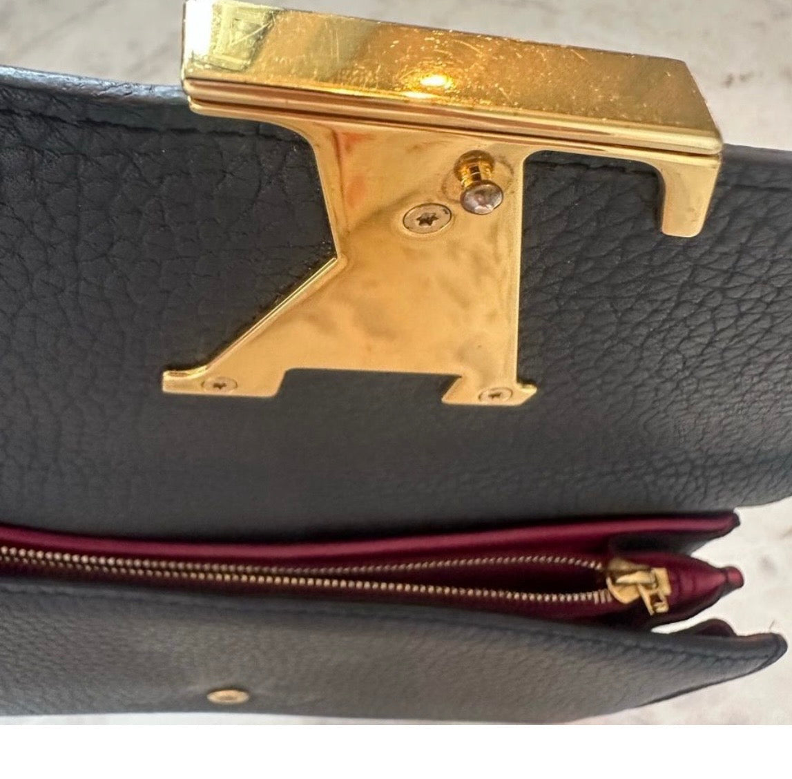 Louis Vuitton Capucines Wallet – Black Taurillon Leather / Hot Pink Interior