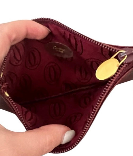 Cartier Must de Cartier burgundy leather zip pouch/clutch