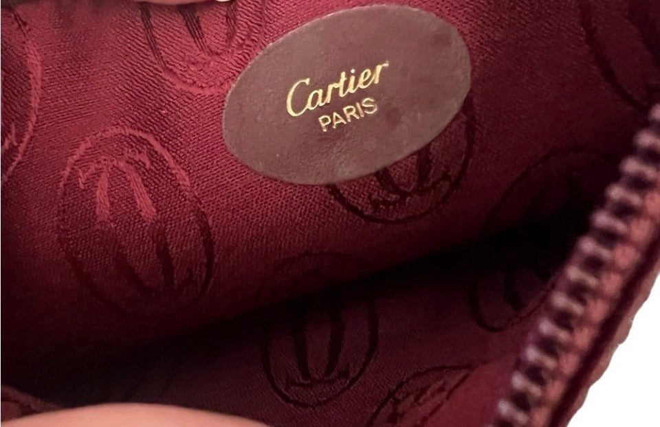Cartier Must de Cartier burgundy leather zip pouch/clutch