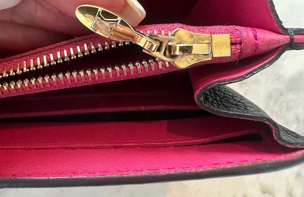 Louis Vuitton Capucines Wallet – Black Taurillon Leather / Hot Pink Interior