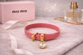 Miu Miu Crystal Charm Leather Bracelet – Pink Madras Leather Gold Tone