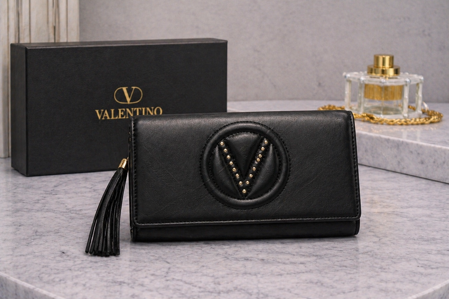Mario Valentino V Logo Leather Clutch with Stud Detail & Tassel – Black