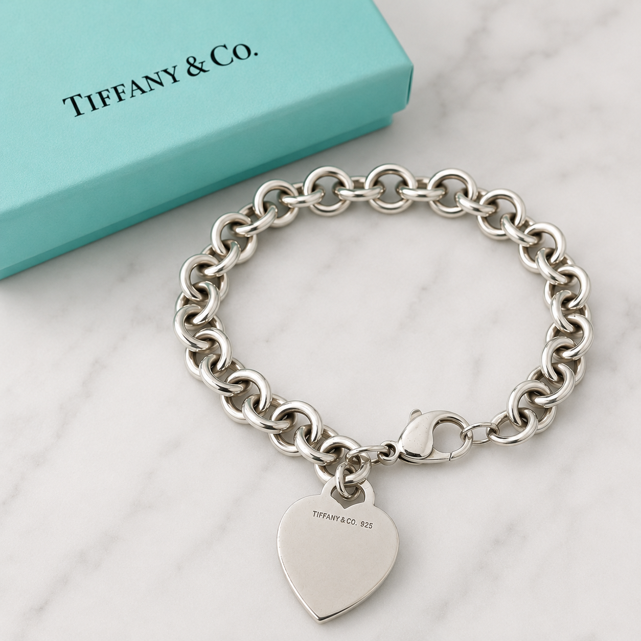 Tiffany & Co. sterling silver heart tag charm bracelet